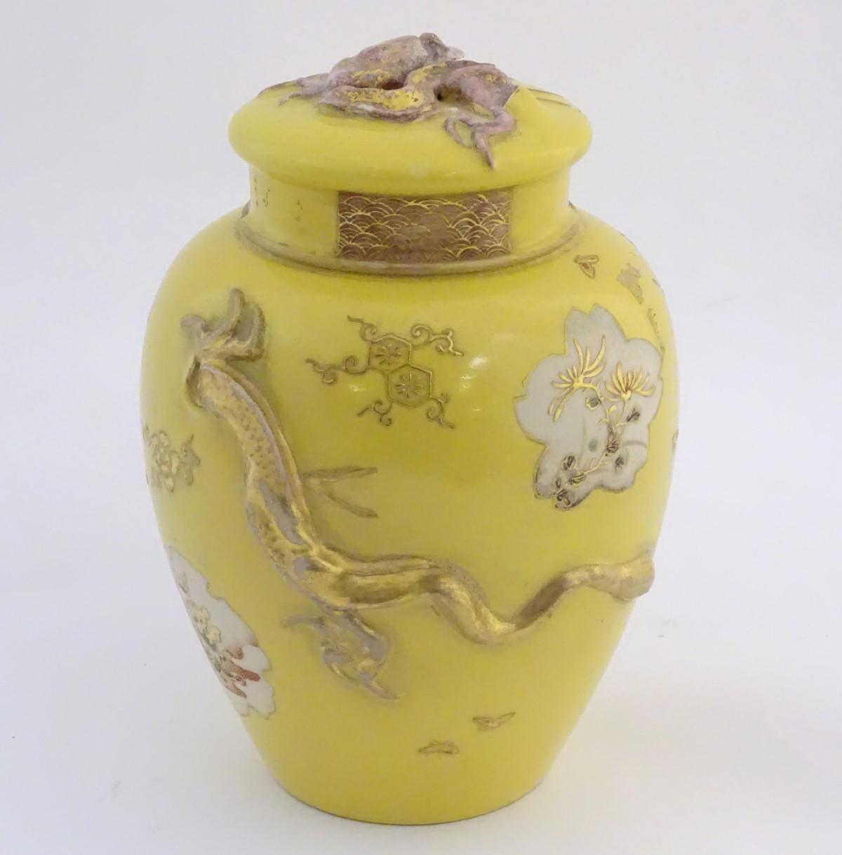 A Chinese yellow ground ginger jar with lid and lid liner. The body with gilt decoration in relief - Image 2 of 19