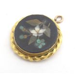 Grand Tour jewellery : A gold pendant set with pietra dura decoration ( unmarked - tests as 15ct