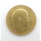 A 22ct gold 1905 Edward VII half sovereign coin, approximately 4g Please Note - we do not make