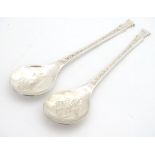 Two silver Christmas spoons by Peter Jackson hallmarked Sheffield 1977 / 1983 5 1/2" long Please