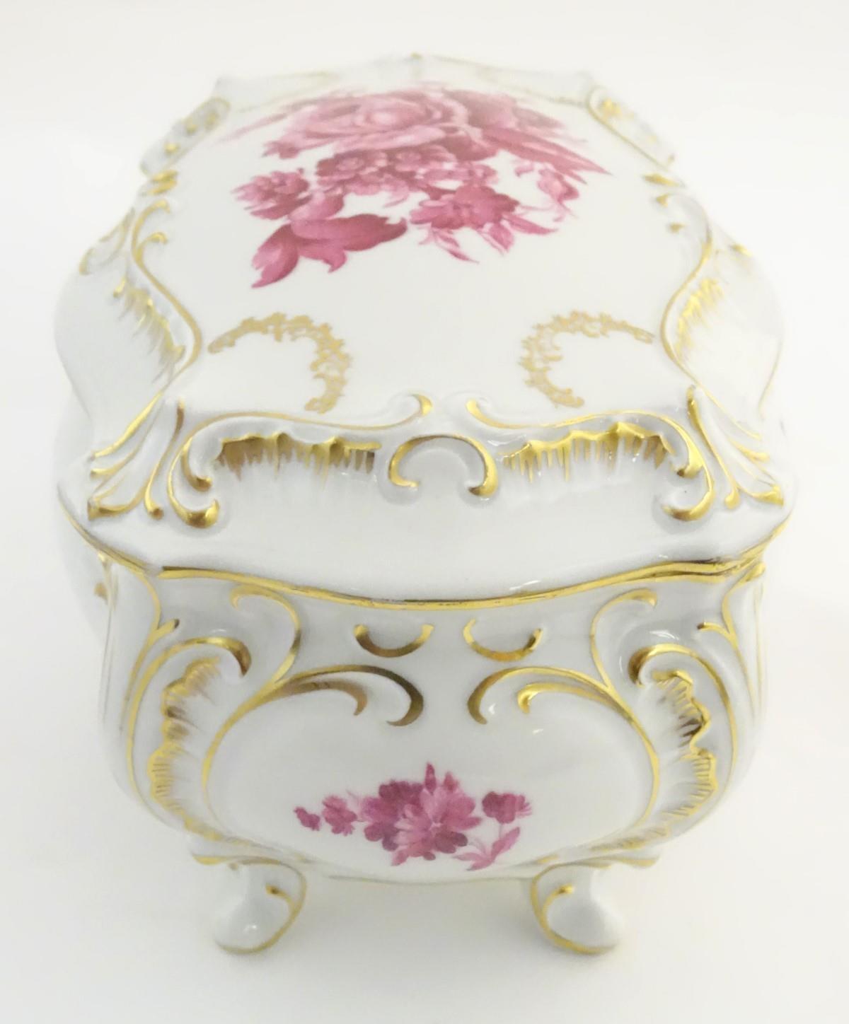 A German Graf von Henneberg porcelain casket and cover decorated with pink flowers and foliage and - Image 2 of 13