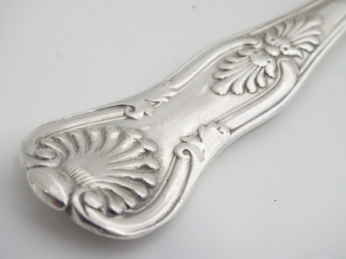 A set of 11 Geo IV silver kings pattern table spoons . Hallmarked London 1828 maker William - Image 3 of 15