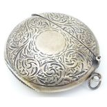 A silver vesta case of circular form with hinged lid. Hallmarked Sheffield maker David Scott-