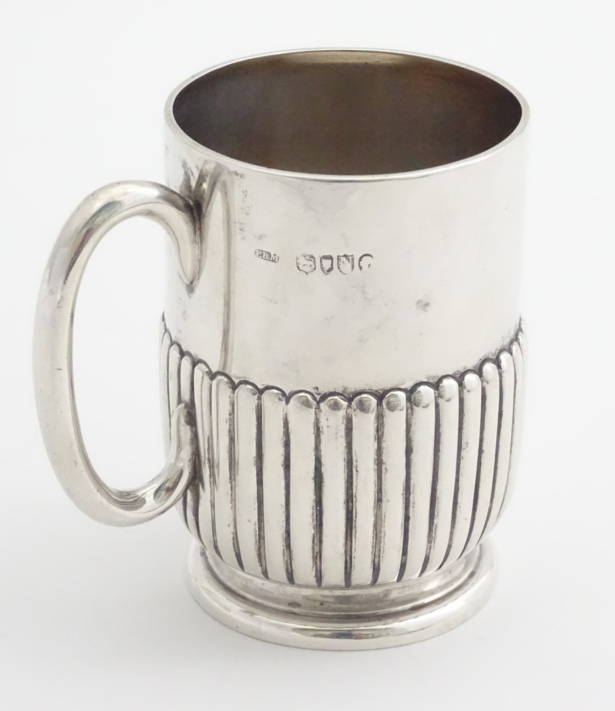 A silver Christening mug with loop handle. hallmarked London 1888 maker Army & Navy Cooperative