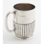 A silver Christening mug with loop handle. hallmarked London 1888 maker Army & Navy Cooperative