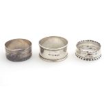 Three various hallmarked silver napkin rings. (34g) Please Note - we do not make reference to the