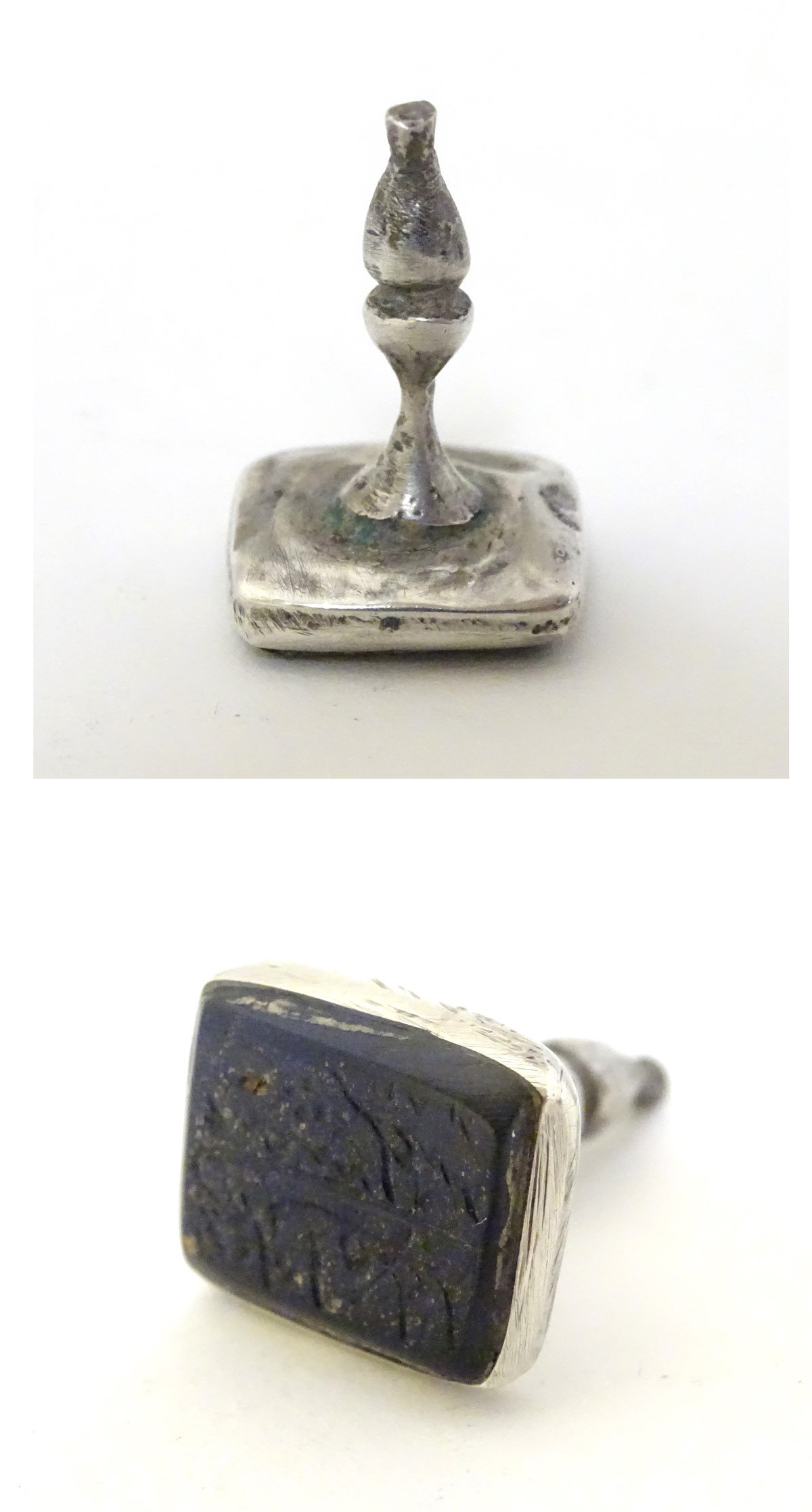 A white metal fob seal with hard stone seal under engraved with Arabic / Islamic script approx 1"