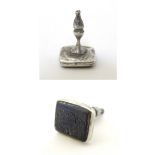 A white metal fob seal with hard stone seal under engraved with Arabic / Islamic script approx 1"