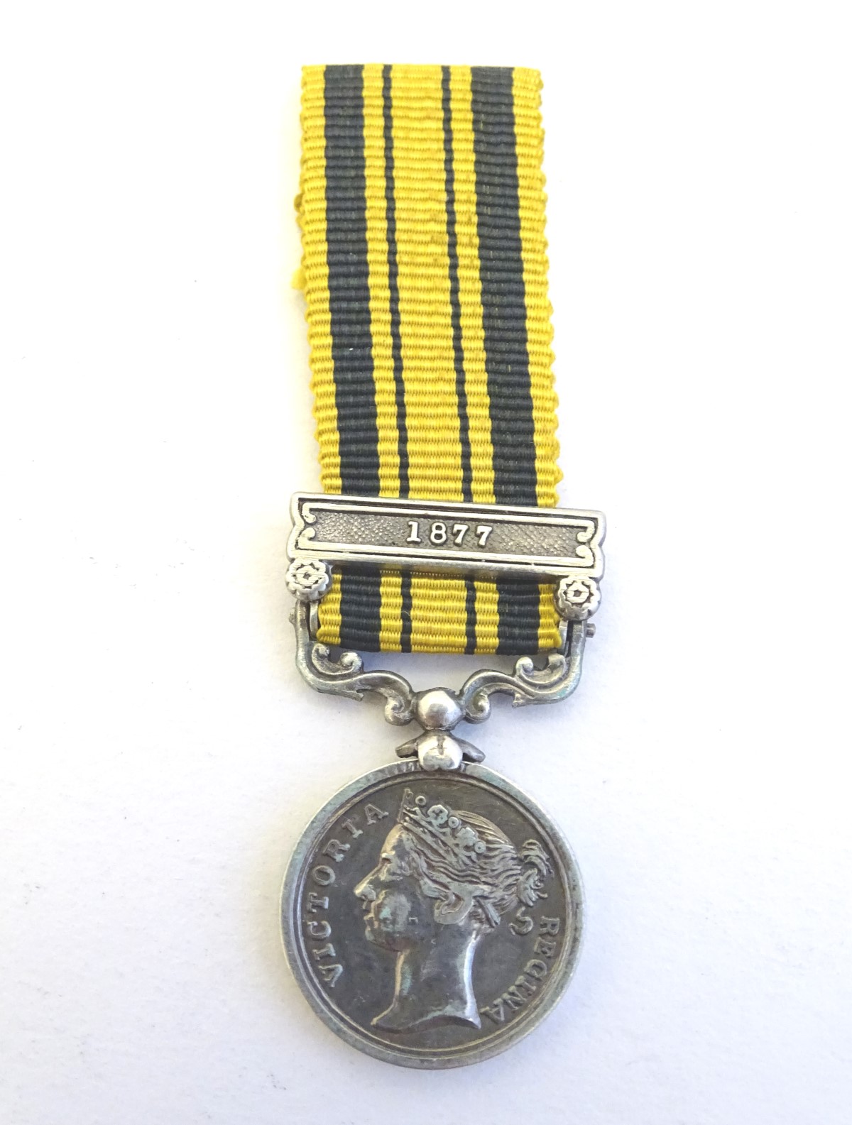 Militaria: a Victorian miniature South Africa Medal, with 1877 bar, 2" long (including ribbon.)