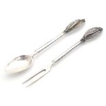 A Continental silver fork and spoon with filigree deportation. Approx 6" long Please Note - we do