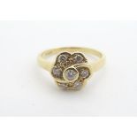 An 18ct gold ring set with 7 brilliant cut diamonds. Ring size approx size N. Please Note - we do