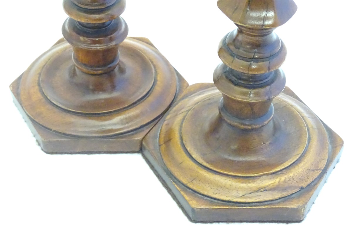 Treen: A pair of 19thC turned and carved wooden candlesticks with hexagonal bases. Approx. 10 3/4" - Image 3 of 8