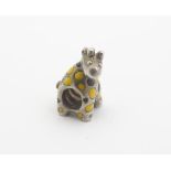 A .925 silver novelty bead charm formed as a giraffe with enamel decoration. 1/2" high Please Note -