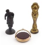 A 19thC yellow metal pendant fob seal with inset bloodstone and carnelian rotating roundels to