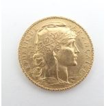 A French Republic 20 franc gold coin, 1907, approximately 6.5g Please Note - we do not make