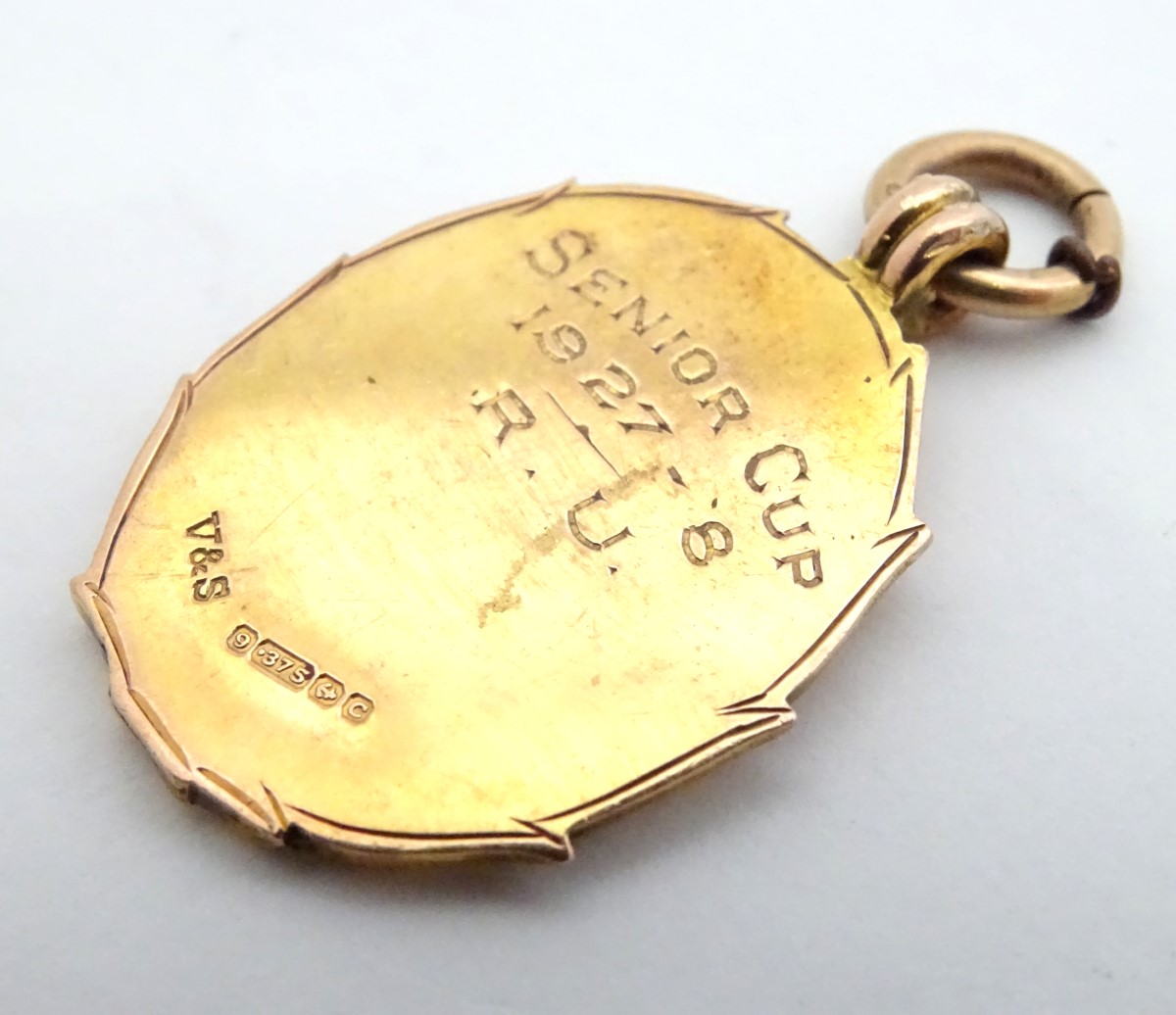 A 9ct gold fob medal with enamelled Wiltshire Football Association emblem. Total weight 8g Please - Image 9 of 13