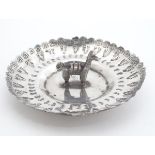 A South American .900 silver pin dish with Llama decoration to centre. 3" wide Please Note - we do
