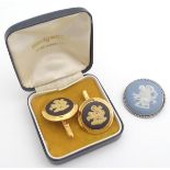 A white metal brooch set with Wedgwood blue jasperware cabochon together with a pair of gold