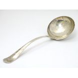 A silver Hanoverian pattern ladle with rats tail to bowl. Hallmarked Sheffield 1964 maker