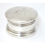 A silver dressing table top powder pot, hallmarked Birmingham 1920 maker A & J Zimmerman Ltd. Please