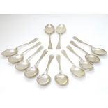 A set of 12 silver Hanoverian pattern table spoons with rats tail bowls. Hallmarked Sheffield 1964