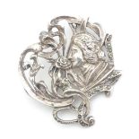 A silver Art Nouveau style brooch with marcasite detail. 1 1/2" wide Please Note - we do not make