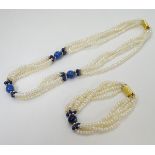 A 4 strand pearl necklace with lapis lazuli beads and gilt metal clasp, together with matching