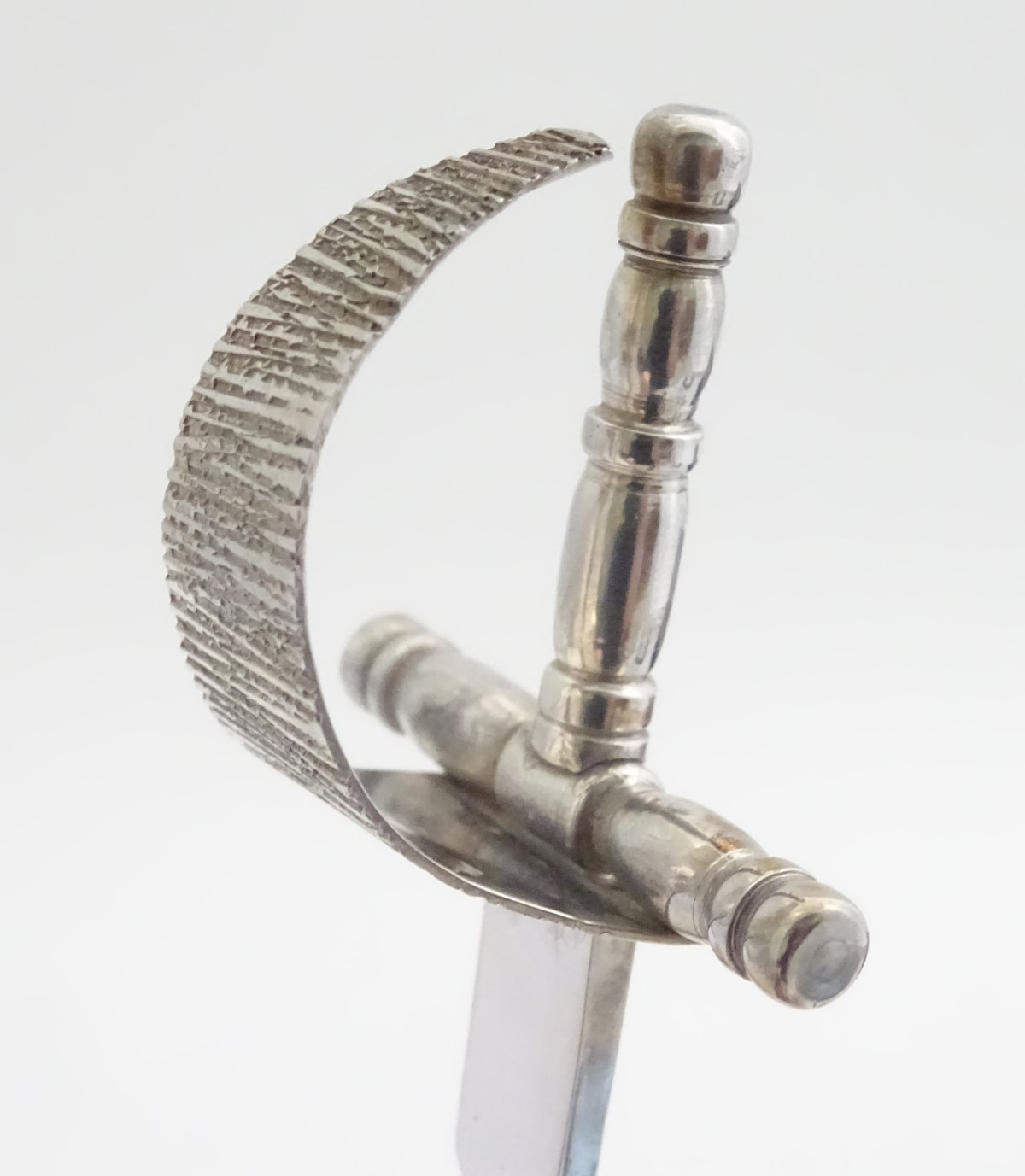 A silver novelty silver paper knife in the form of a basket hilt rapier sword. Hallmarked - Image 7 of 8
