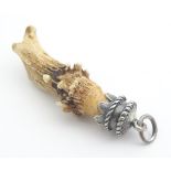 A Victorian hunting trophy pendant set with deer antler with .800 German silver mount 1 1/2" long