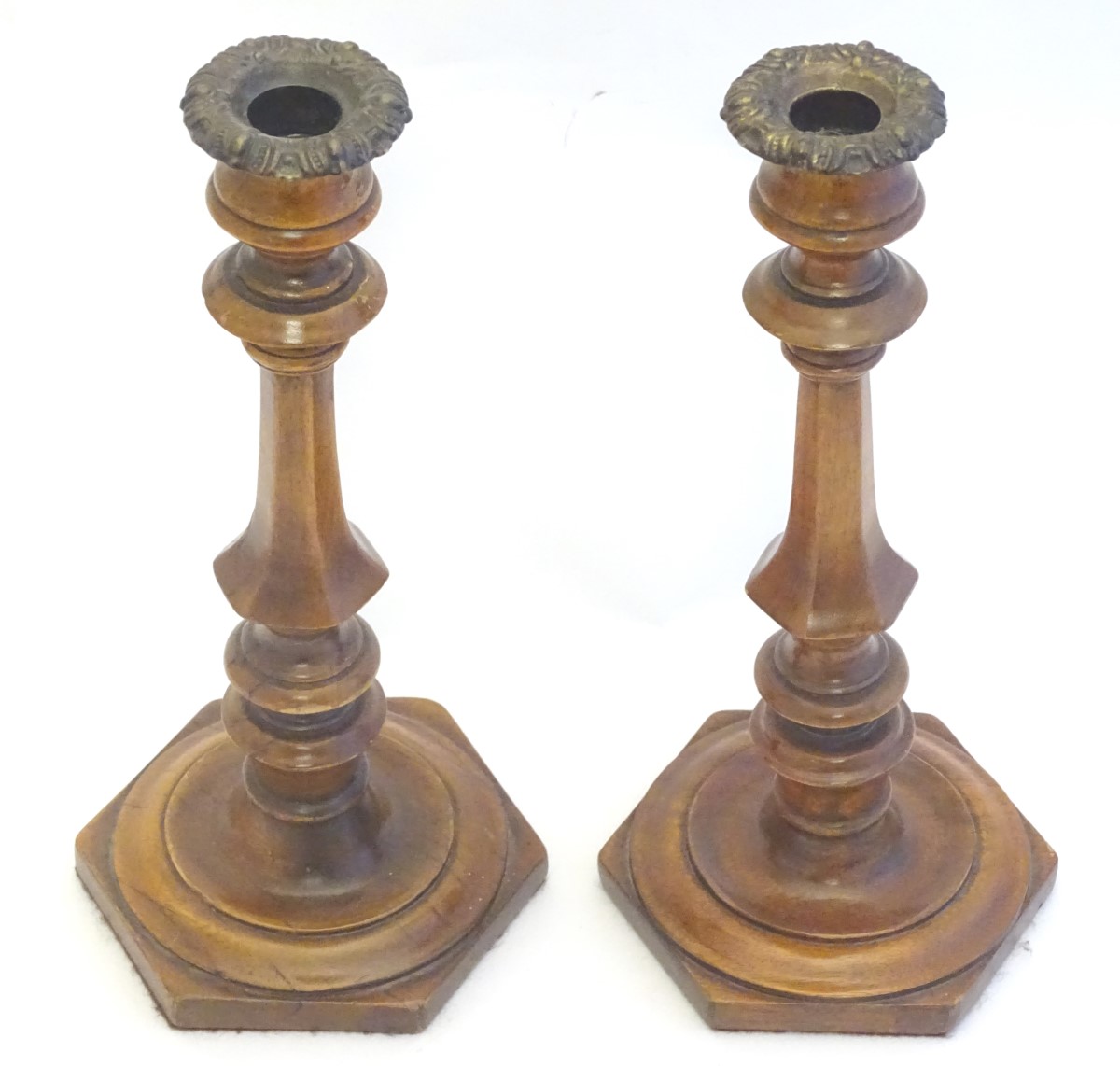 Treen: A pair of 19thC turned and carved wooden candlesticks with hexagonal bases. Approx. 10 3/4" - Image 4 of 8