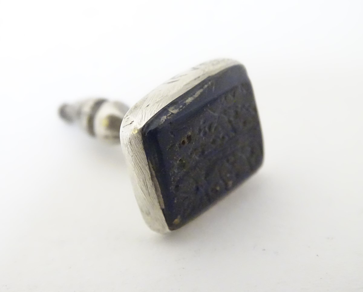A white metal fob seal with hard stone seal under engraved with Arabic / Islamic script approx 1" - Image 7 of 7