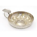 A French silver wine taster / tastevin 4 1/4" long Please Note - we do not make reference to the