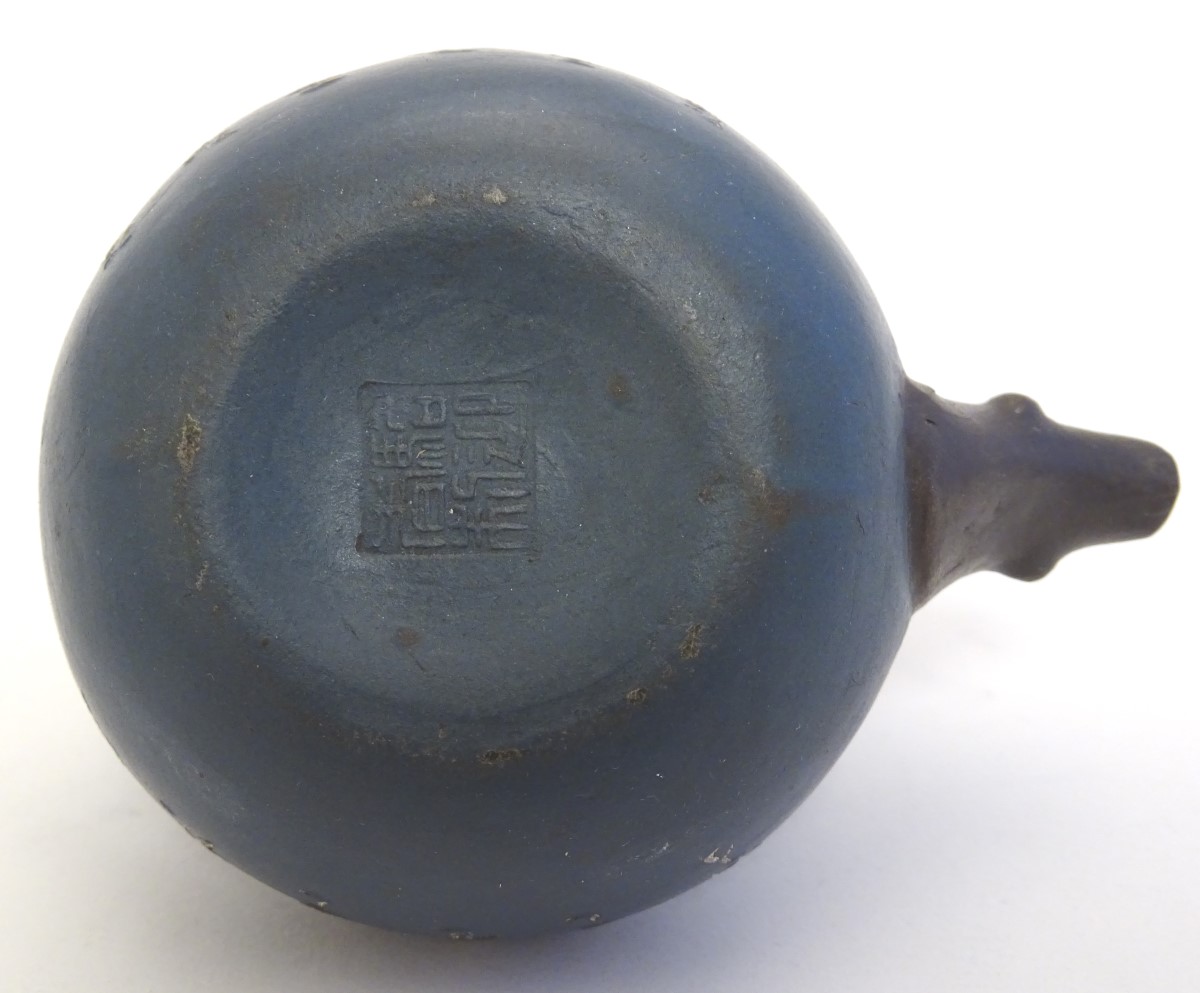 A small Chinese Yixing earthenware / clay teapot and cover with a blue ground, the handle modelled - Image 3 of 13