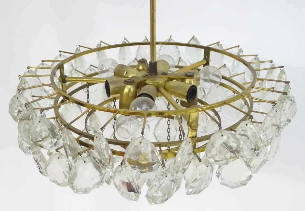 A mid 20thC Italian electrolier, having nine lights illuminating five tiers of glass droplets / - Image 5 of 7