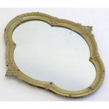A 20thC Quatrefoil formed mirror with egg and dart moulded frame. 15'' wide x 17'' high Please