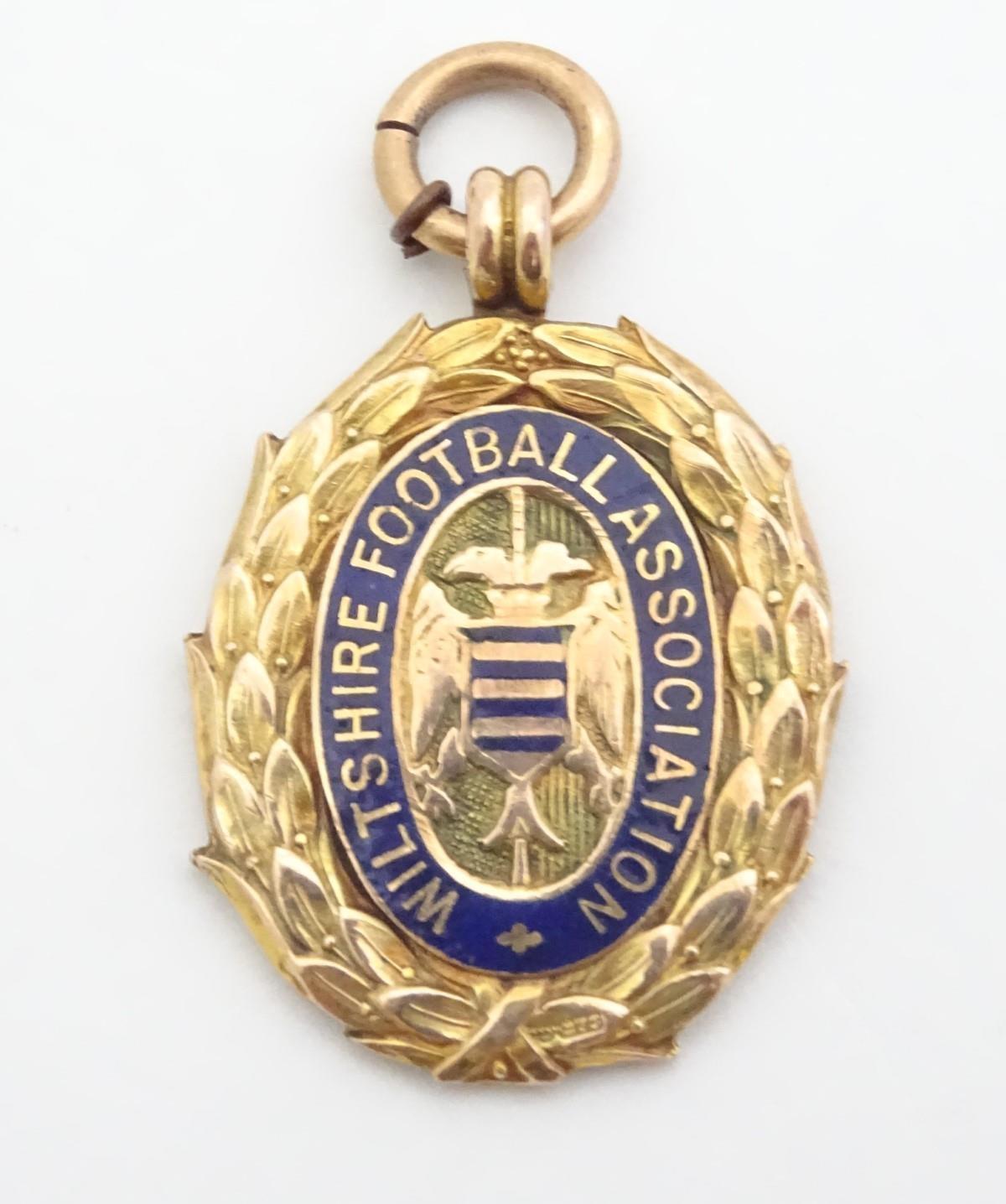 A 9ct gold fob medal with enamelled Wiltshire Football Association emblem. Total weight 8g Please - Image 2 of 13