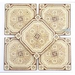 Five Victorian tiles the centre decorated with flowers and foliage with a geometric border.