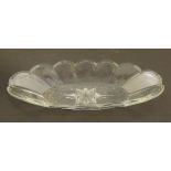 An American early-20thC oblong clear glass dish, with sunburst decoration to base, marked '