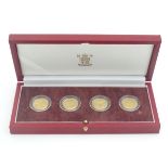 A Royal Mint set of four £1 proof pattern coins, 2003 edition, the reverse sides with depictions