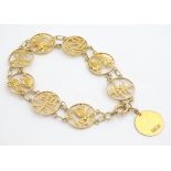 A 14ct gold bracelet decorated with flowers, birds and Oriental character marks. Please Note - we do
