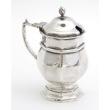 A large silver mustard pot of octagonal pedestal form. Hallmarked London 1898 4" high Please