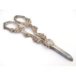 A pair of silver plate grape shears with fruiting vine decoration. Please Note - we do not make