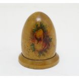 A Victorian Mauchline ware thimble holder of domed form with foliate decoration. With a silver
