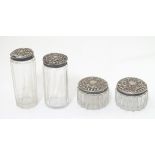 Assorted glass dressing table jars with silver top, hallmarked Birmingham 1904 , Birmingham 1907 and