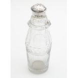 A Geo III silver cruet bottle, the glass bottle with silver pepper top hallmarked Sheffield 1808