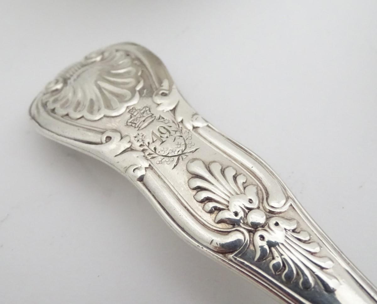 A set of 11 Geo IV silver kings pattern table spoons . Hallmarked London 1828 maker William - Image 6 of 15