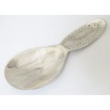 A silver caddy spoon with hammered decoration. Hallmarked London 1998 maker ET Please Note - we do