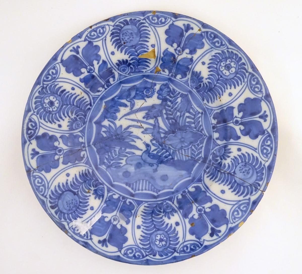 A blue and white Chinese Export Kraak style charger, with panelled decoration depicting stylised - Image 6 of 9