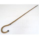 An unusual continental 19thC shepherd's crook, of wicker construction (woven strands of willow) with