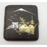 An early 20thC Japanese Amita cigarette case with damascene style 3-metal inlaid decoration